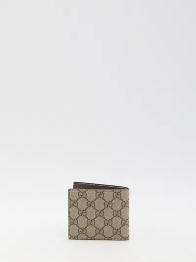Gucci Men Gg Bi-fold Wallet In Brown