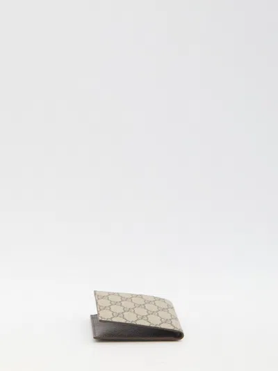 Gucci Men Gg Bi-fold Wallet In Brown