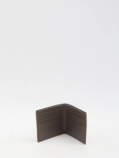Gucci Men Gg Bi-fold Wallet In Brown