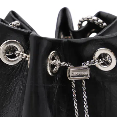 Jimmy Choo Eyelet Chain Bucket Bag With Metallic Handle In Black