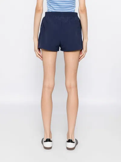 Sporty And Rich Sr Runner Track Short In Blue
