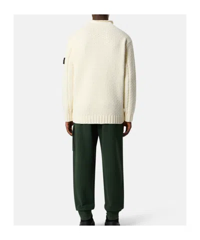 Stone Island Turtleneck With Iconic Logo On The Sleeve In Yellow