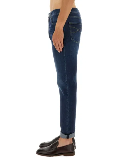 Brunello Cucinelli Relaxed-fit Jeans With Rolled Cuffs In Blue