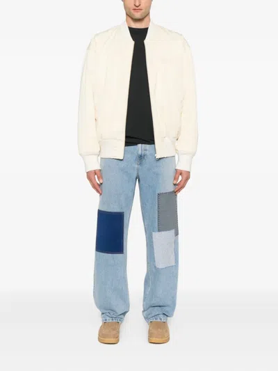 Axel Arigato Zine Embroidered Jeans In Cyan Denim In Blue