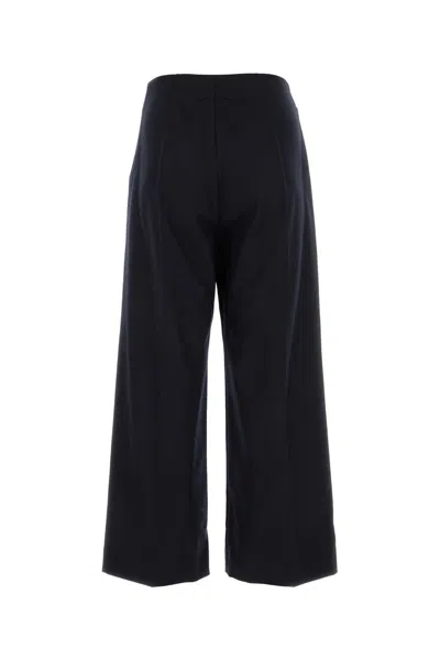 Patou Flared High-waisted Wool Blend Trousers