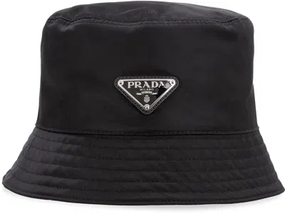 Prada Logo-embellished Shell Bucket Hat In Black