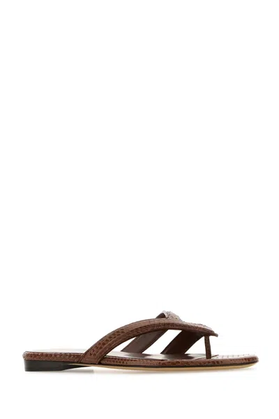 Fendi Textured Leather Thong Sandals With Silhouette In Brown