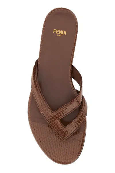 Fendi Textured Leather Thong Sandals With Silhouette In Brown