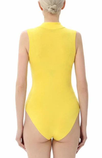 Kimi & Kai Turtleneck Sleeveless Bodysuit In Yellow