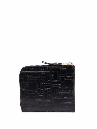 Comme Des Garçons Embossed Logotype Wallet In Black