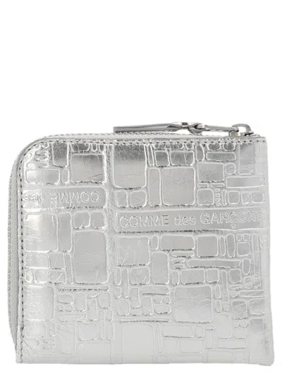 Comme Des Garçons 'embossed Logotype' Wallet In Neutral