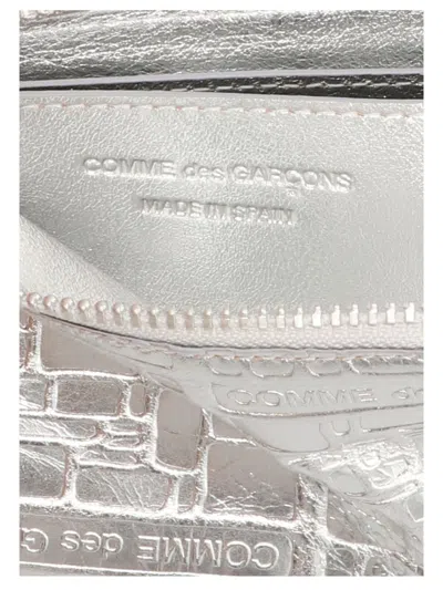 Comme Des Garçons 'embossed Logotype' Wallet In Neutral