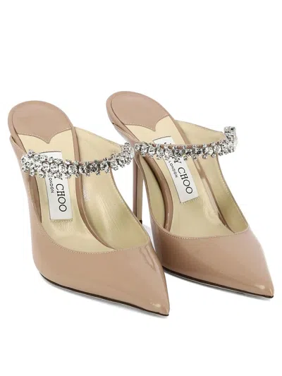 Jimmy Choo Bing 100 Patent Leather Pumps In Gold