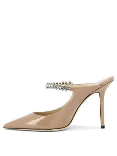 Jimmy Choo Bing 100 Patent Leather Pumps In Gold