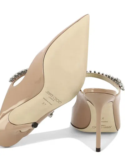 Jimmy Choo Bing 100 Patent Leather Pumps In Gold