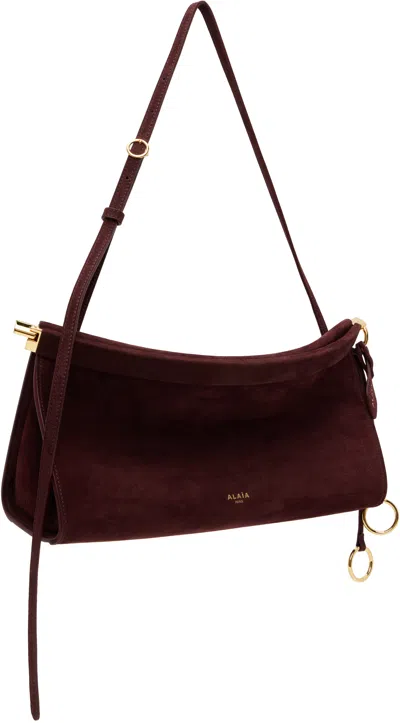 Alaïa Burgundy 'le Click' East West Medium Bag