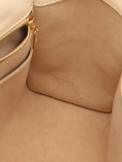 Pre-owned Louis Vuitton 2019 On My Side Mm Handbag In Neutral