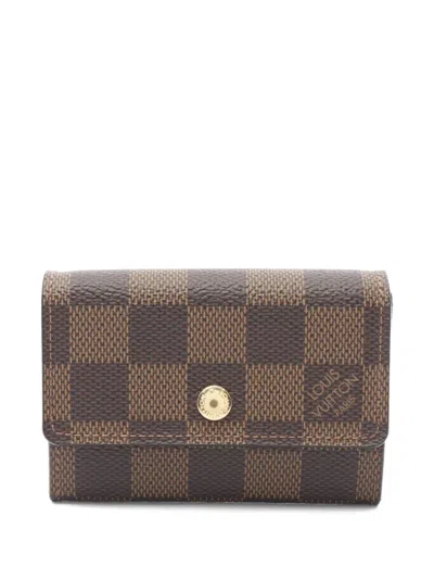 Pre-owned Louis Vuitton 2007 Damier Ebène Coin Purse In Brown