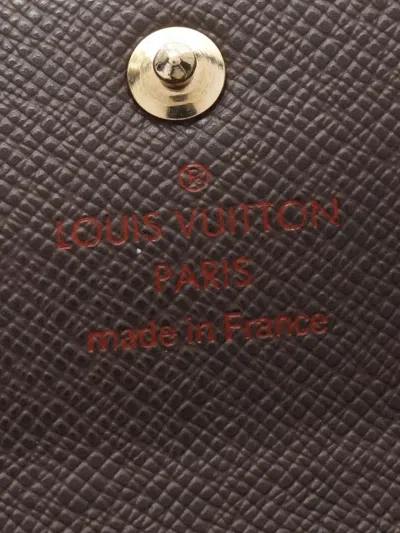 Pre-owned Louis Vuitton 2007 Damier Ebène Coin Purse In Brown