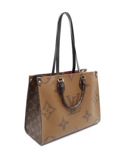 Pre-owned Louis Vuitton 2021 Monogram Giant Reverse On-the-go Mm Tote Bag In Brown