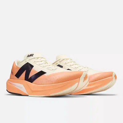 New Balance Men's Fuel Cell Rebel V4 Shoes In Orange Beige