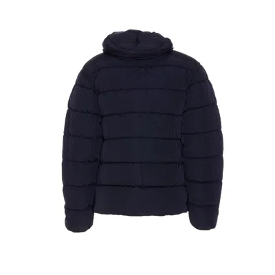 C.p. Company Blue Down Jacket With Fixed Hood And Logo Plaque On The Sleeve In Tech Fabric Man In Blue