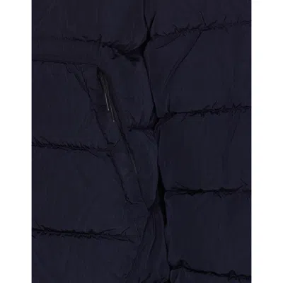C.p. Company Blue Down Jacket With Fixed Hood And Logo Plaque On The Sleeve In Tech Fabric Man In Blue