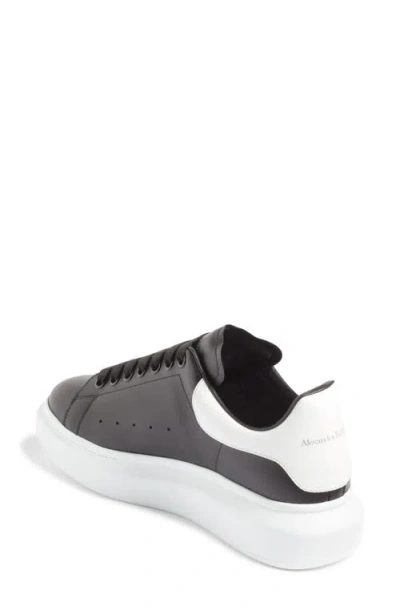 Alexander Mcqueen Black Low Top Sneakers With Chunky Sole And Contrasting Heel In Leather Man In Black