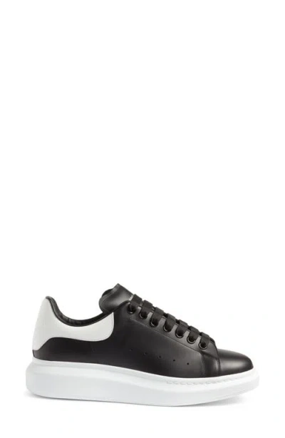 Alexander Mcqueen Black Low Top Sneakers With Chunky Sole And Contrasting Heel In Leather Man In Black