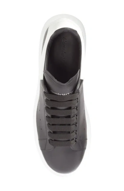 Alexander Mcqueen Black Low Top Sneakers With Chunky Sole And Contrasting Heel In Leather Man In Black