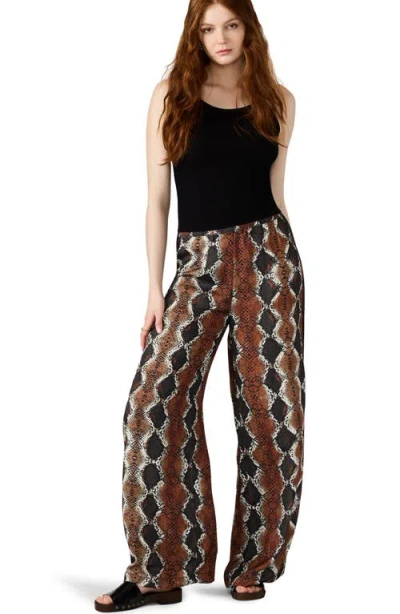 Steve Madden Moxie Snakeskin Print Side Stripe Wide Leg Pants In Brown