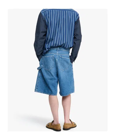 Jw Anderson Twisted Workwear Anchor-patch Denim Shorts In Blue