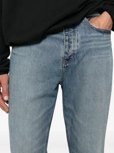 Essentials Logo-patch Jeans In Blue