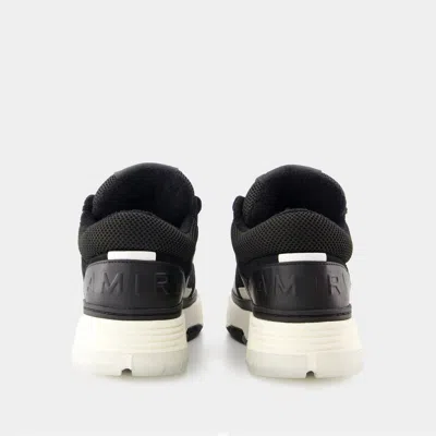 Amiri Black Low Top Sneakers With Logo Patch On The Tongue And Logo Lettering On The Heel In Leather Man