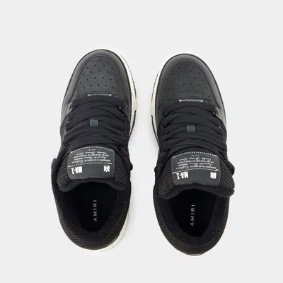 Amiri Black Low Top Sneakers With Logo Patch On The Tongue And Logo Lettering On The Heel In Leather Man