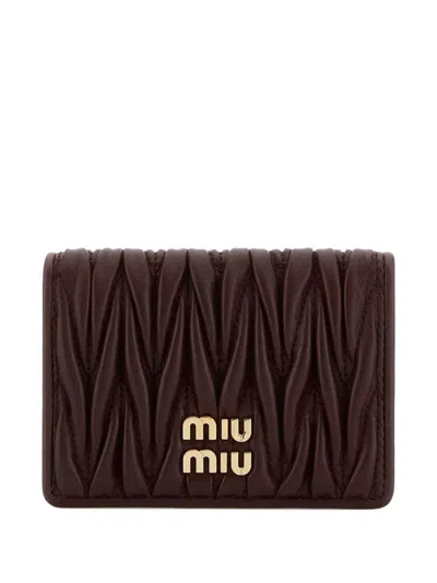 Miu Miu Women Matelassã© Leather Wallet With Metal Logo In Brown
