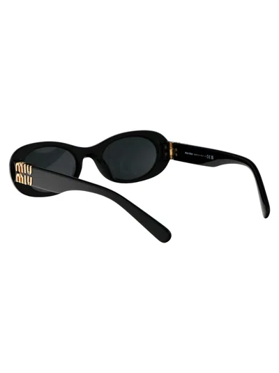 Miu Miu Logo-lettering Oval-frame Sunglasses In Black