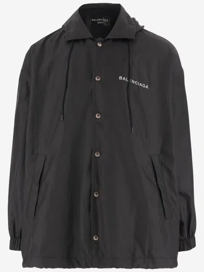 Balenciaga Hooded Raincoat With Drawstring And Pockets In Black