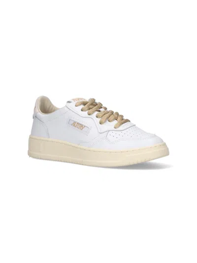 Autry Low-top Sneakers With Suede Accents And Golden Details In White