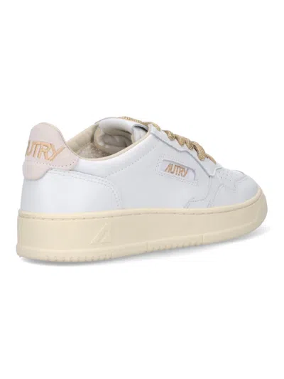Autry Low-top Sneakers With Suede Accents And Golden Details In White