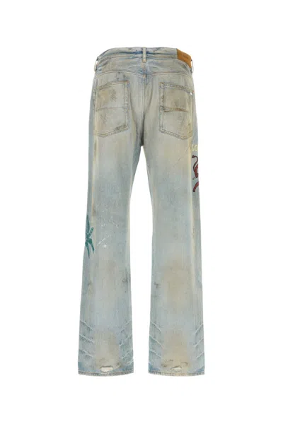 Amiri Distressed Embroidered Denim Trousers In Gray