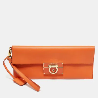 Pre-owned Ferragamo Orange Leather Afef Lock Story Wristlet Clutch