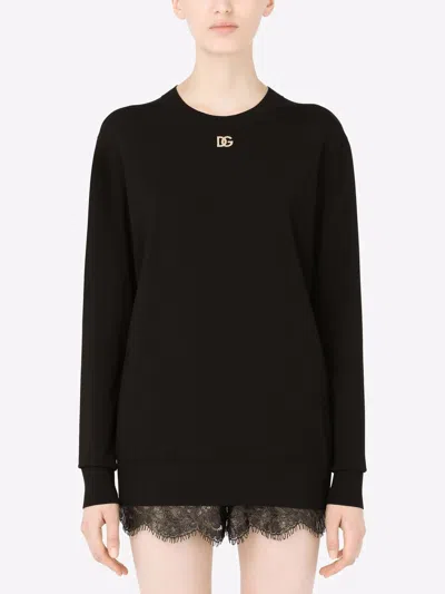 Dolce & Gabbana Viscose Sweater With Crystal Dg Embellishment In Black