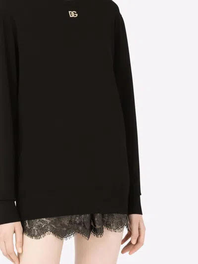 Dolce & Gabbana Viscose Sweater With Crystal Dg Embellishment In Black