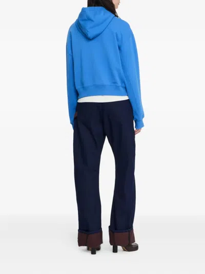 Jw Anderson Anchor Logo Embroidered Crop Hoodie In Blue