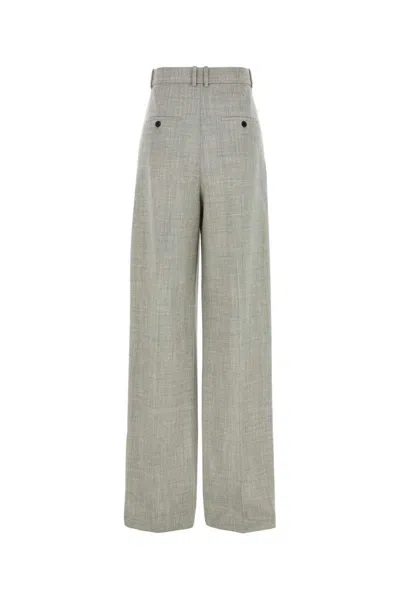 Saint Laurent Wool Trousers With Wide Leg And Pleated Front