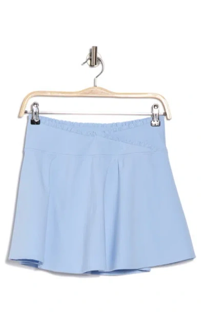 Yogalicious Lux Kinsley Ruffle Crossover Waist Skort In Blue