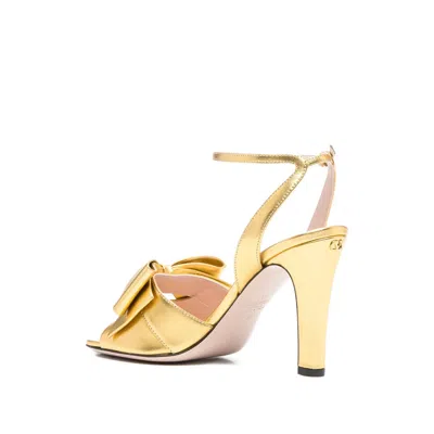 Valentino 100mm Bow-embellished Ankle-strap Sandals In Gold
