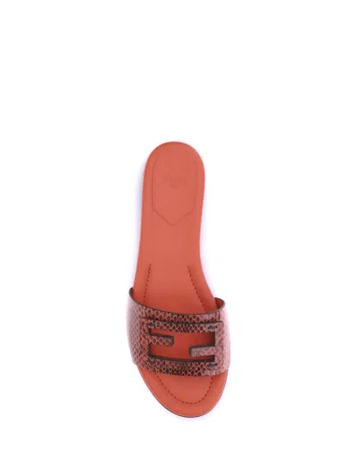 Fendi Leather Flat Sole Slides With Metal Embellishment