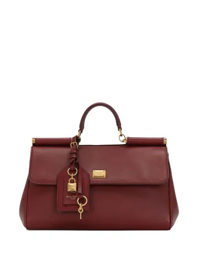 Dolce & Gabbana Bordeaux Handbag With Key And Padlock Detail And Adjustable And Removable Shoulder Strap